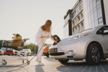 woman-charging-electro-car-electric-gas-station (1) 1